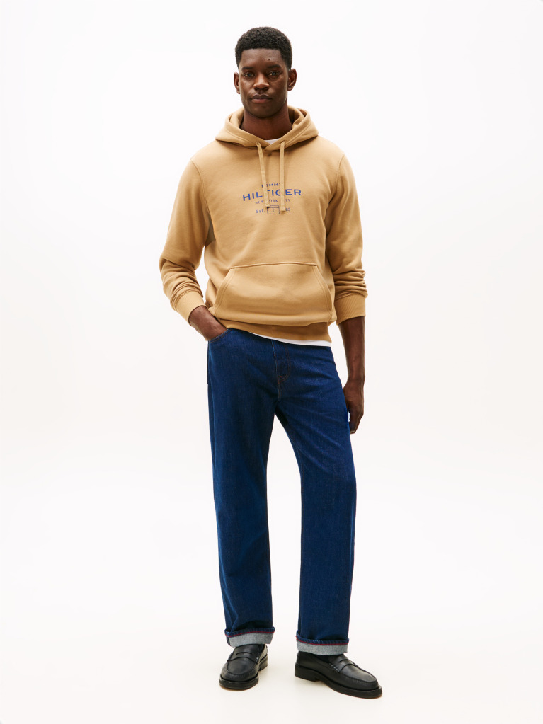 Brown Perfect for fighting the cold, this warm hoodie is enhanced with a stylish, tonal Tommy Hilfiger logo and crafted from high-quality interlock knit.  Men